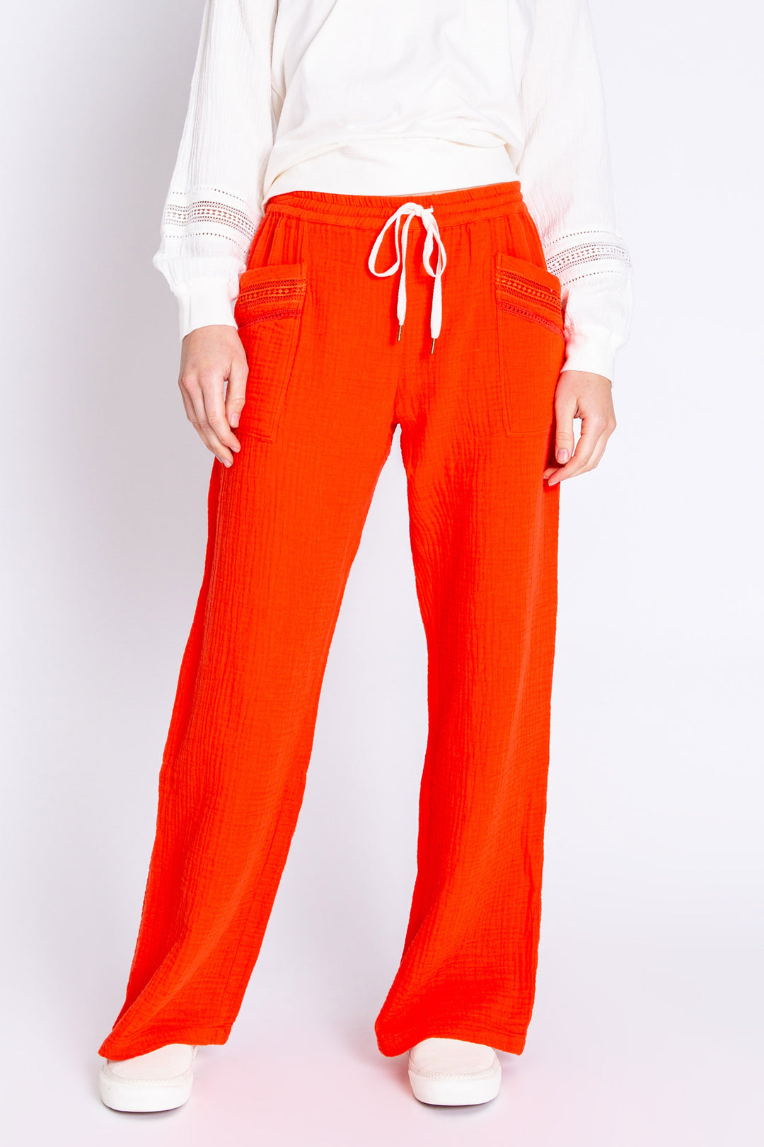 Woven cotton gauze lounge pant with front patch pockets with lattice-detail. Straight leg pant with elasticized & ivory tie-waist. (6589210460260)