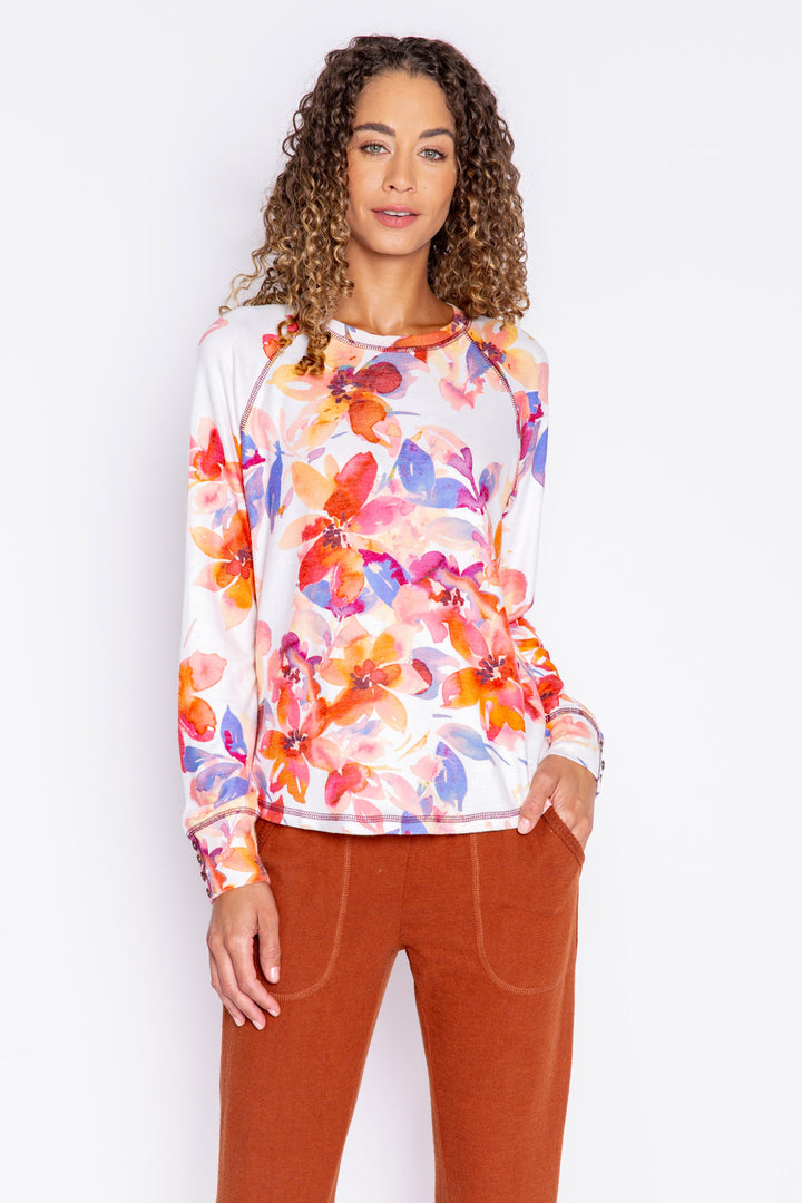 Long sleeve top with button cuffs, printed with autumn watercolor floral. Rounded hem. (6889073279076)