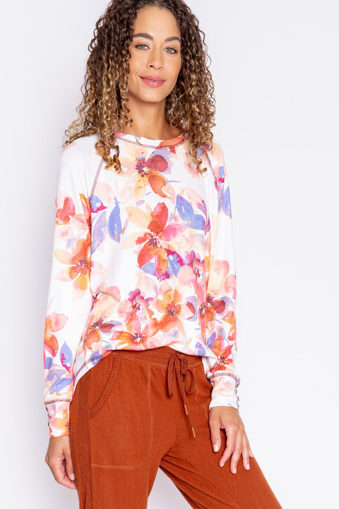 Long sleeve top with button cuffs, printed with autumn watercolor floral. Rounded hem. (6889073279076)