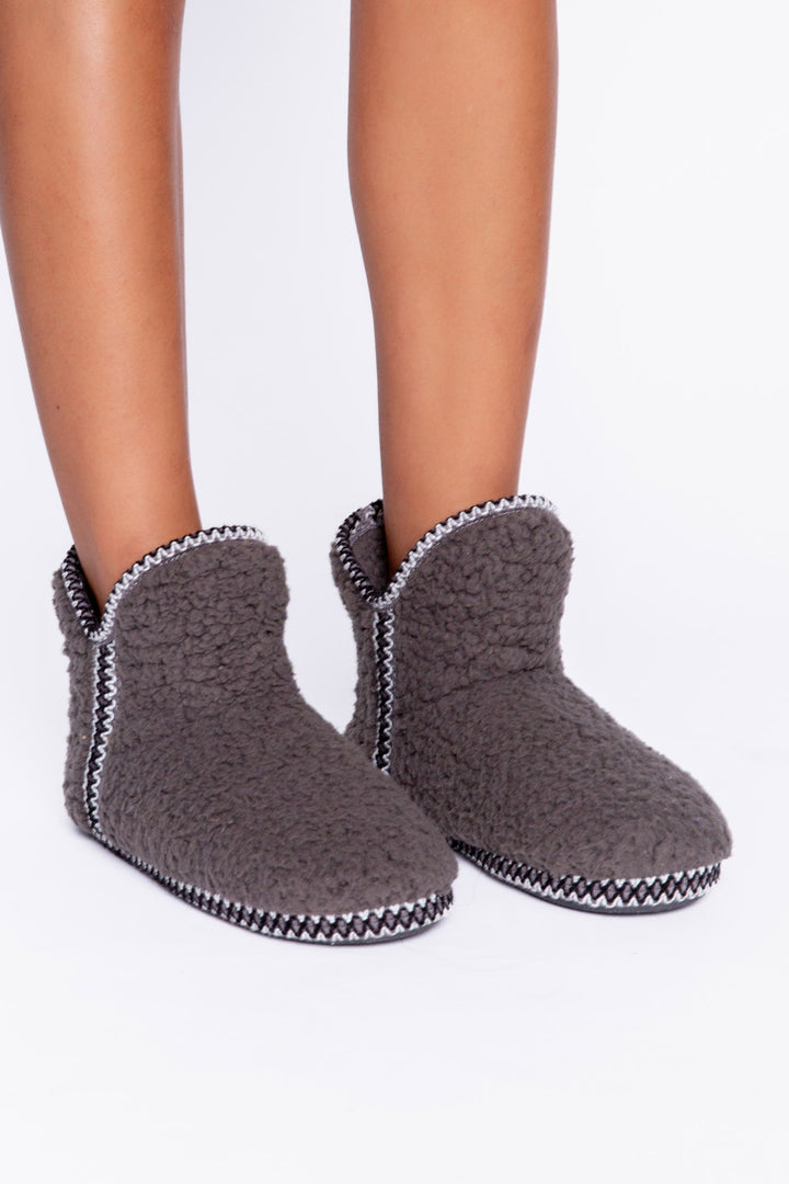 Cozy grey bootie in plush with faux shearling lining. Embroidered stars on back of boot. (6982901694564)