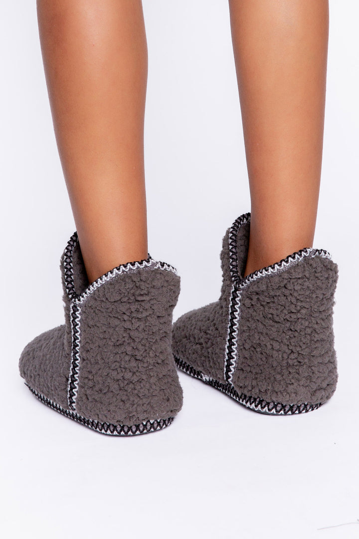 Cozy grey bootie in plush with faux shearling lining. Embroidered stars on back of boot. (6982901694564)