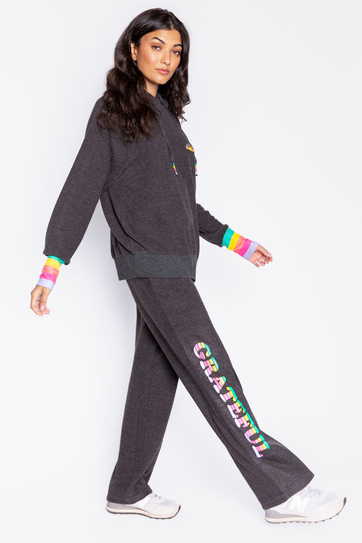 Pullover hoody in dark slate with multi-color striped cuffs & multi-sun embroidered chest. (6982905102436)