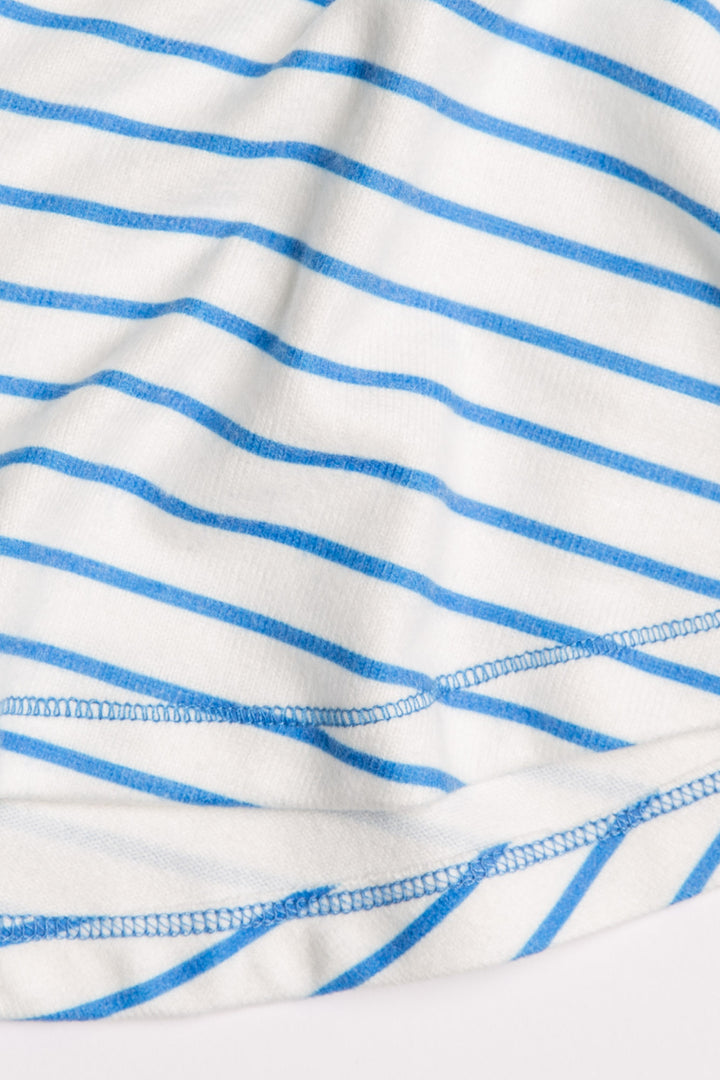 Ivory racerback tank top with blue striped print on peachy jersey fabric. (7125182873700)