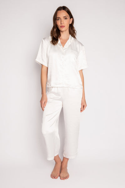 White lounge set in aloe-infused woven faux silk with short sleeve button-down top and lounge pant. (7125190934628)