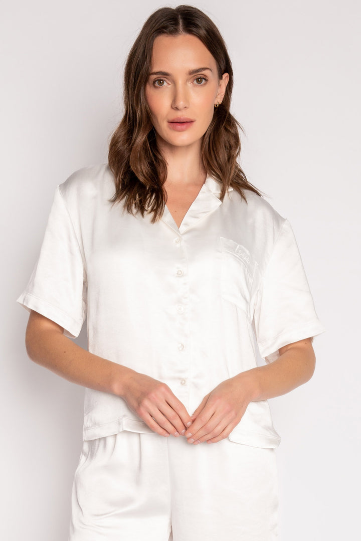 White lounge set in aloe-infused woven faux silk with short sleeve button-down top and lounge pant. (7125190934628)