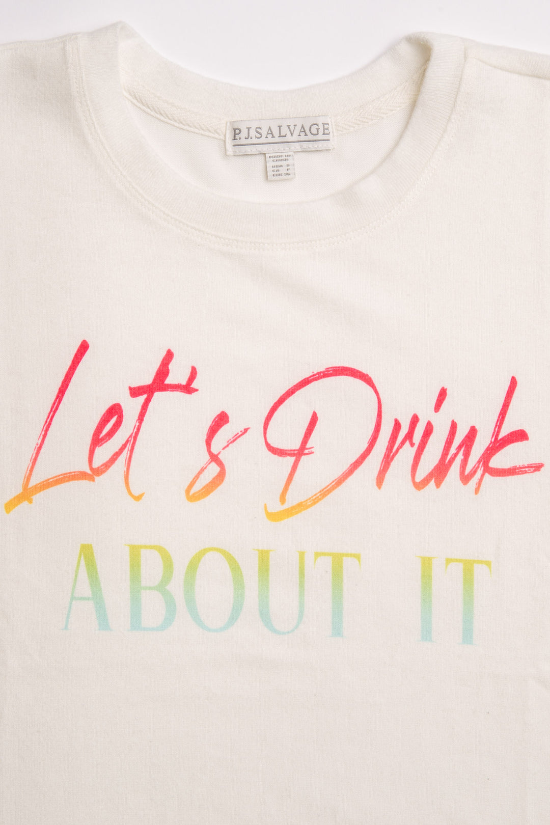 Ivory crew neck tank top on butter jersey fabric with "Let's Drink About It" graphic. (7125191819364)