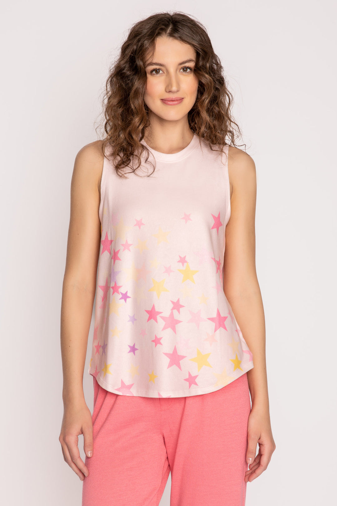 Blush pink crew neck tank top with colorful star print on peachy jersey fabric. (7125198962788)