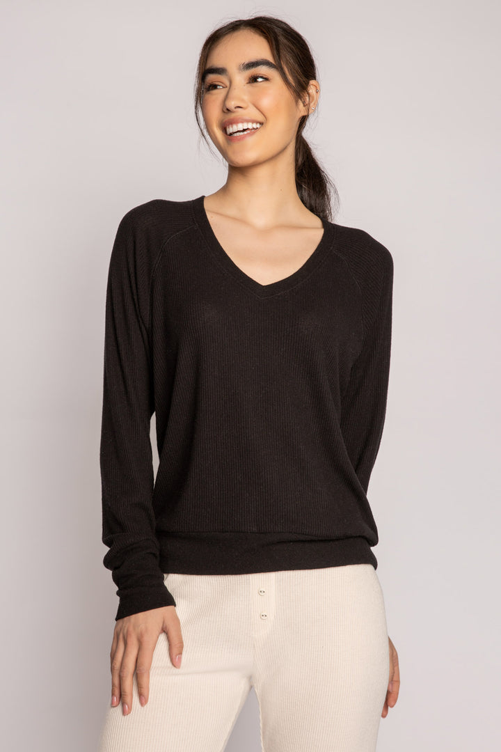 Black V-neck top with relaxed fit in 2x2 peachy rib. Banded sleeve cuff & neck rib. (7122611535972)
