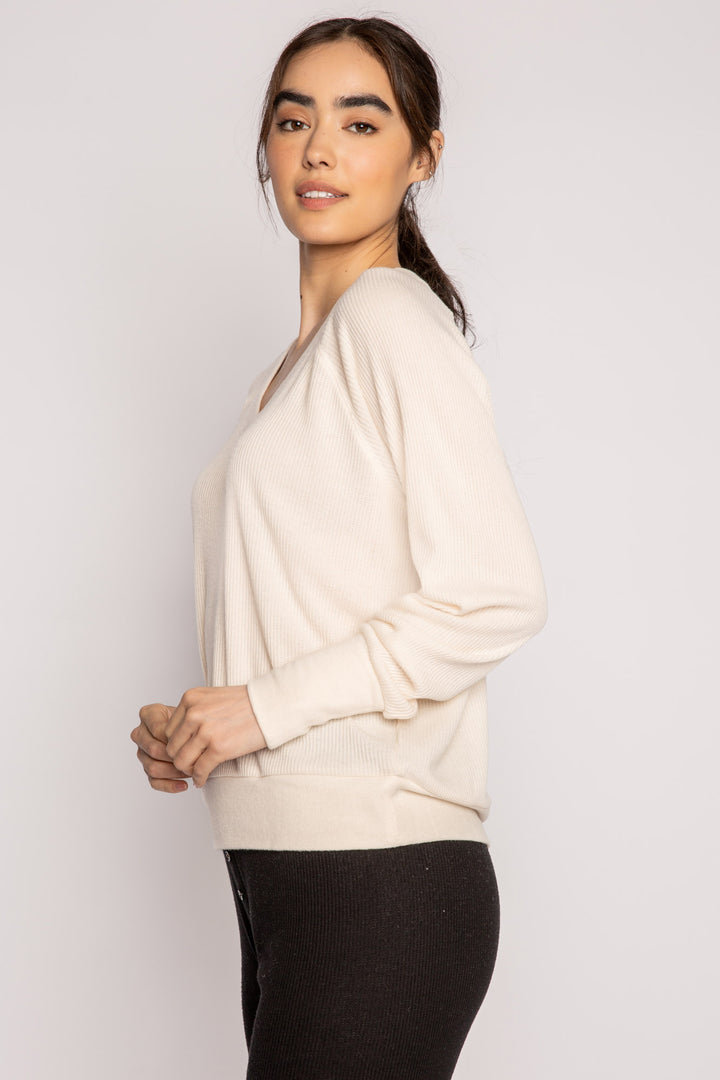 Ivory V-neck top with relaxed fit in 2x2 peachy rib. Banded sleeve cuff & neck rib. (7122611667044)