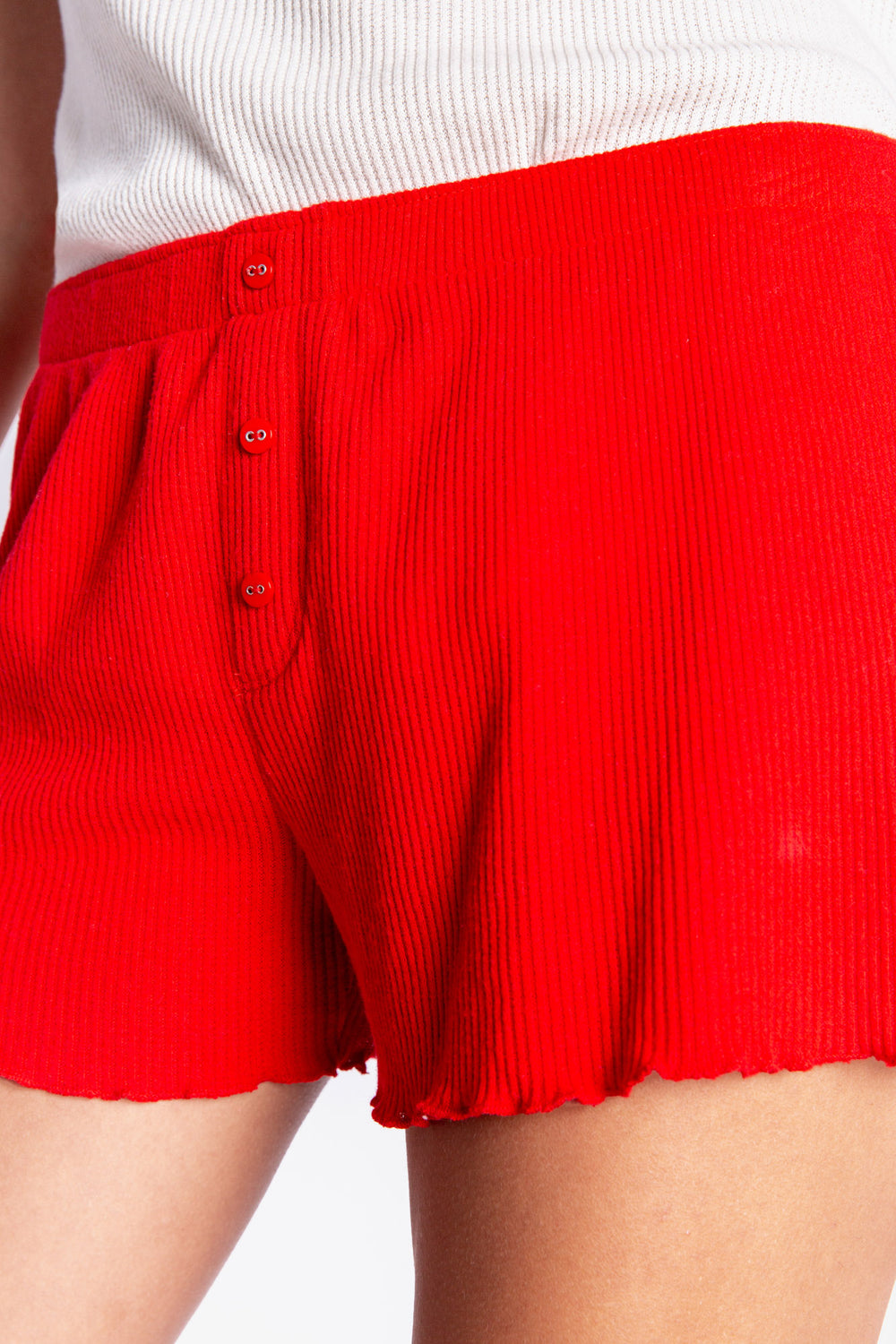 Red rib sleep short. Soft 2x2 peachy rib short with merrowed-stitched hem. (6612551860324)