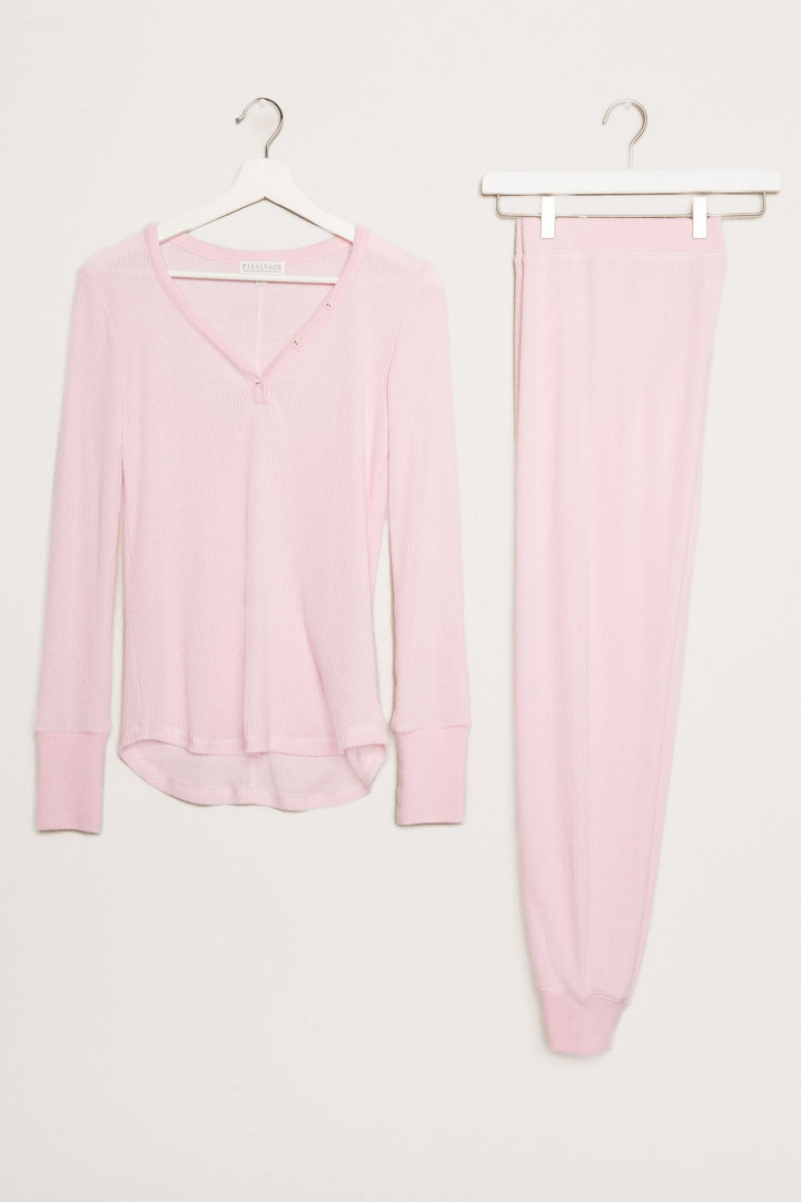 Pink ribbed lounge set with long sleeve V-neck top and jammie pant with faux snap fly. (7122612682852)