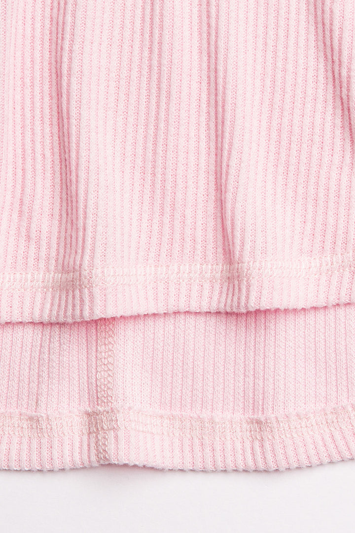 Pink ribbed lounge set with long sleeve V-neck top and jammie pant with faux snap fly. (7122612682852)