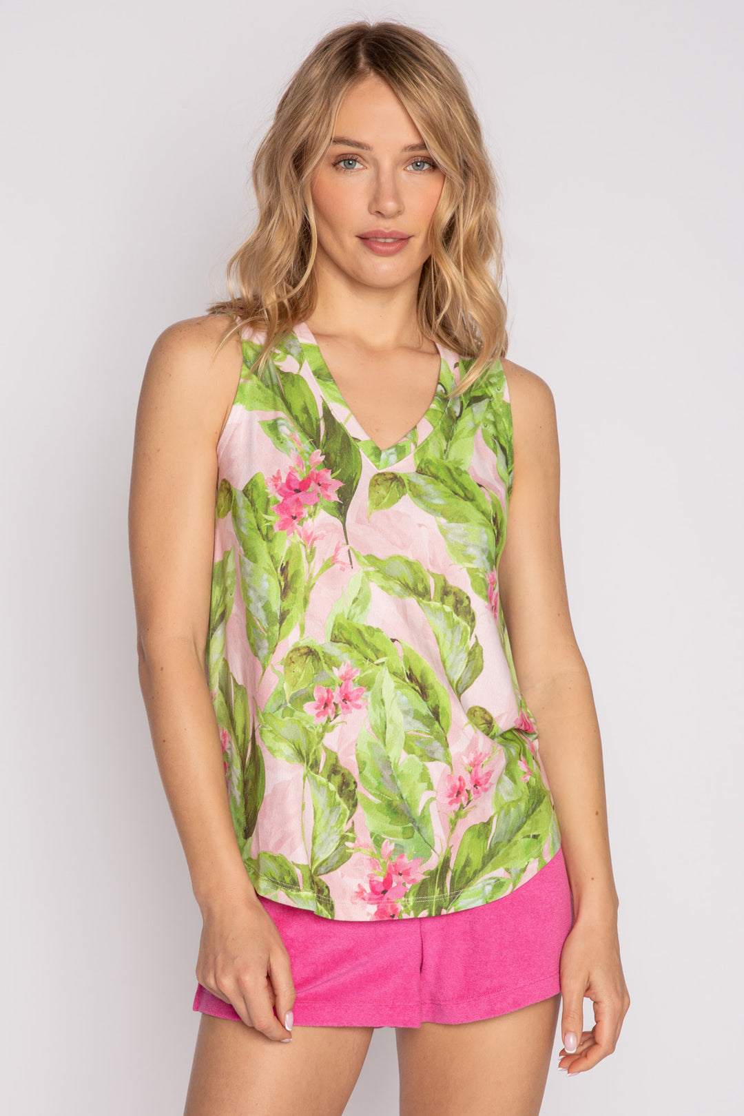 Blush pink loose fit V-neck tank top with green tropical leaf print on a butter jersey fabric. (7181448314980)