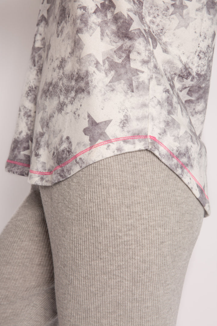 Scoop neck tank top with racer-back. Soft peachy jersey in ivory-black tie-dye star print. (7196189032548)
