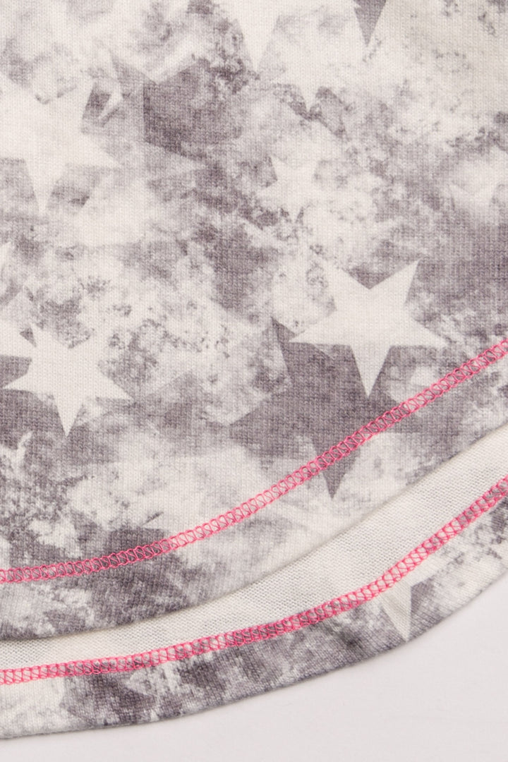 Scoop neck tank top with racer-back. Soft peachy jersey in ivory-black tie-dye star print. (7196189032548)