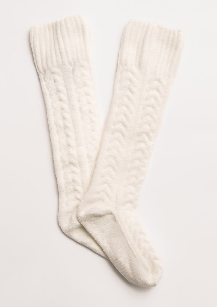 Cozy knee socks in ivory cable-textured chenille with bottom grippers for non-slip feet. (7231865520228)