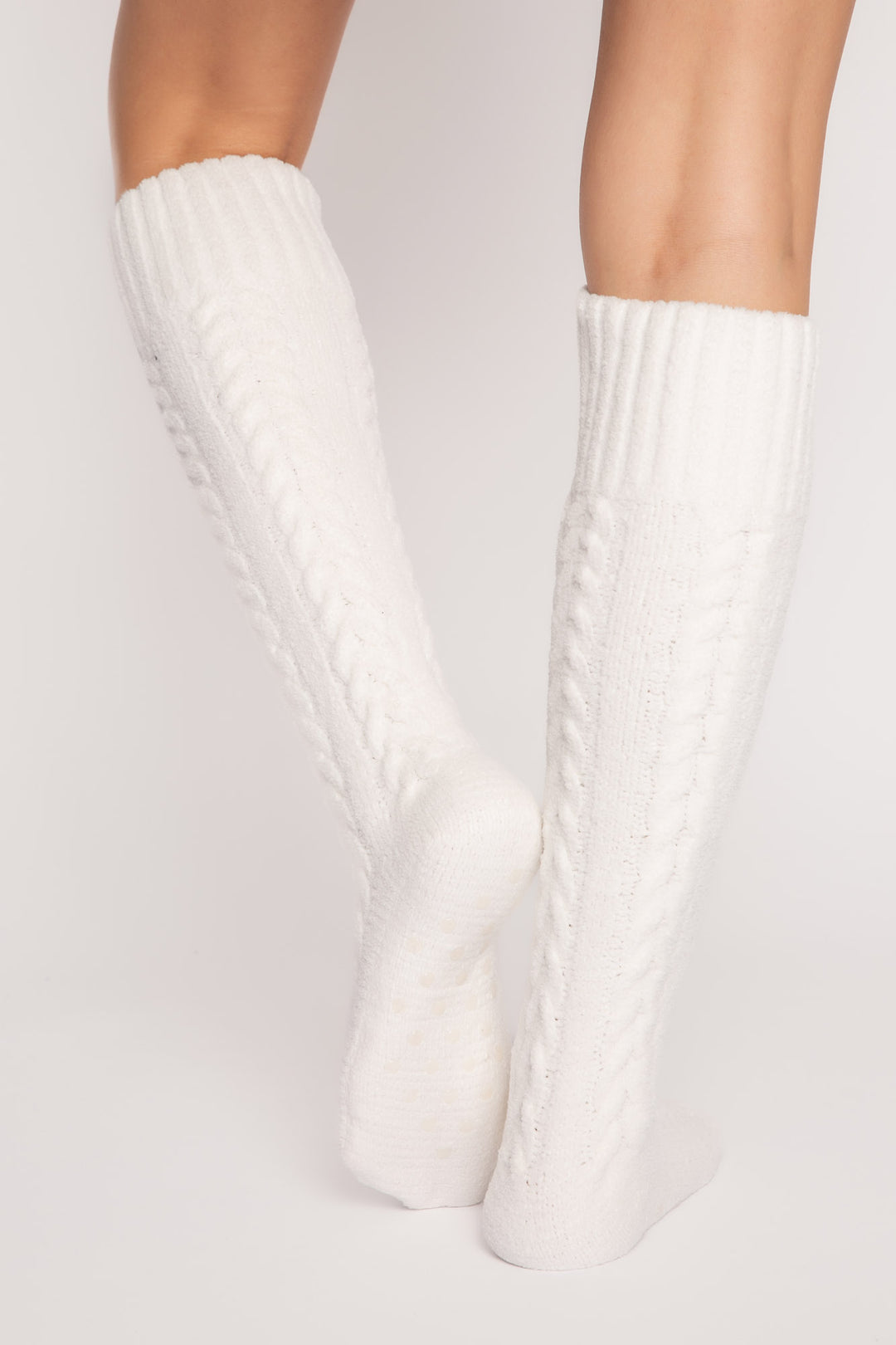 Cozy knee socks in ivory cable-textured chenille with bottom grippers for non-slip feet. (7231865520228)