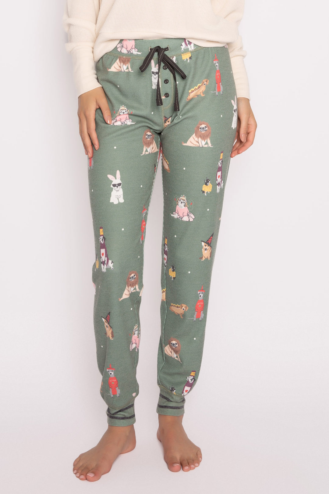 Olive brushed thermal pajama pant, printed with fun multi-breed dogs in costumes. Banded cuffs. (7231867191396)