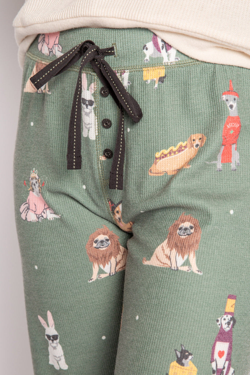 Olive brushed thermal pajama pant, printed with fun multi-breed dogs in costumes. Banded cuffs. (7231867191396)