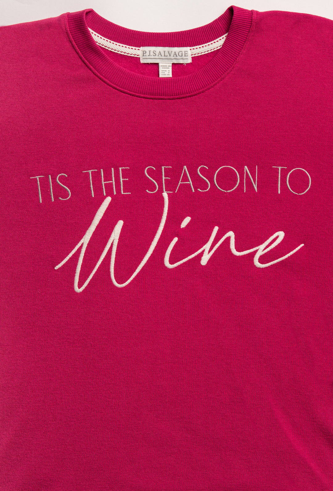 Maroon pullover fleece top with open hem & WINE embroidery lettering on front. (7231868534884)