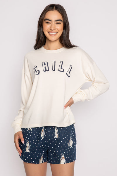Ivory pullover fleece top with open hem & CHILL lettering in puff print. (7231868502116)