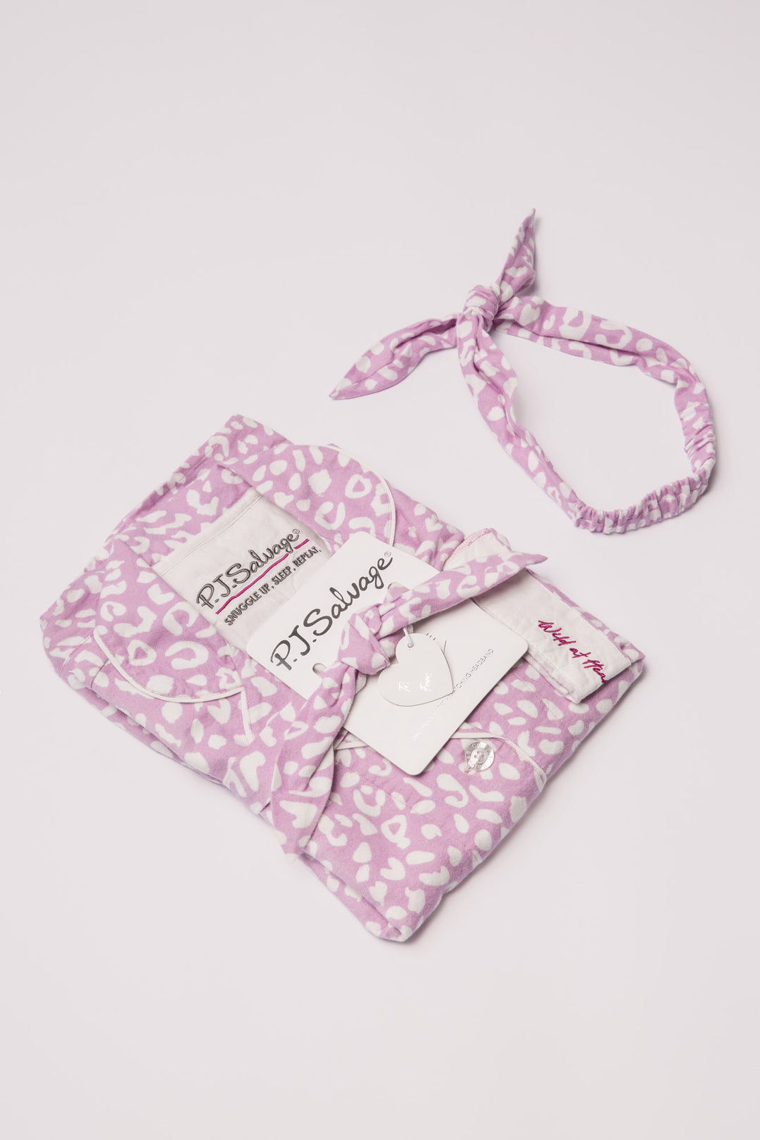 Lilac cotton flannel pajama set w/ white leopard. Button top, pant & matching hair wrap. Embroidered cuff 'Wild at Heart'. (7231869780068)