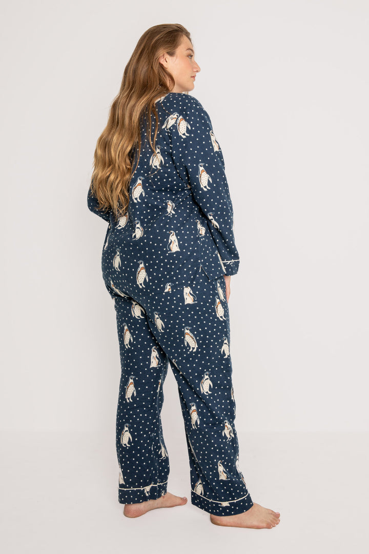 Navy flannel pj set in cotton with white penguin pattern. With matching hair wrap. (7231869517924)