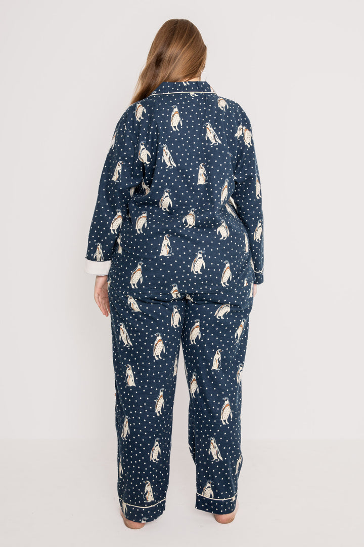 Navy flannel pj set in cotton with white penguin pattern. With matching hair wrap. (7231869517924)