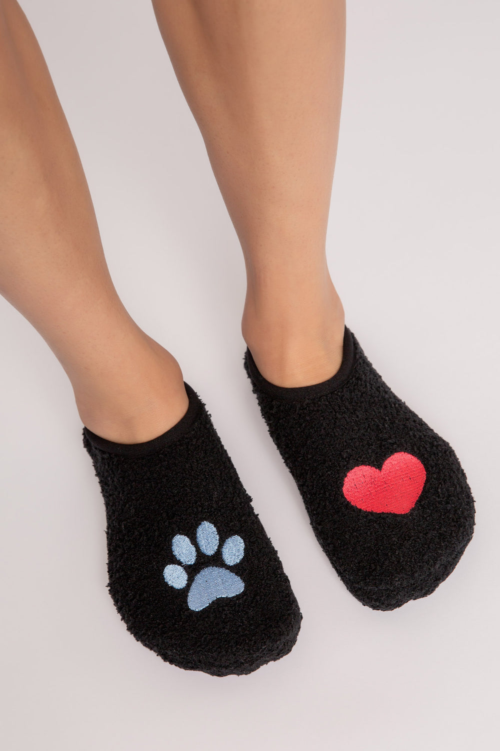 Black cozy slipper-sock with dog paw & heart design on toes. Clear-printed grippers on soles. (6589295624292)