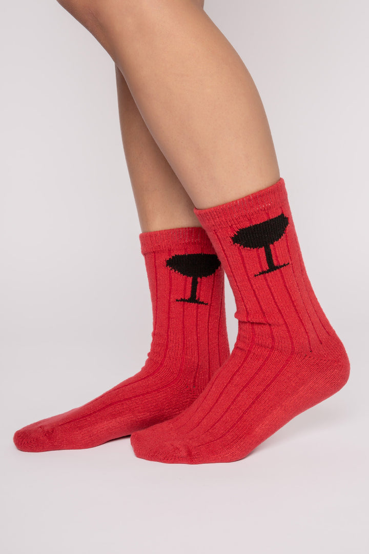Red ribbed socks with wine glasses on ankle & 'rise & wine " printed gripper graphic on soles. (7231871778916)