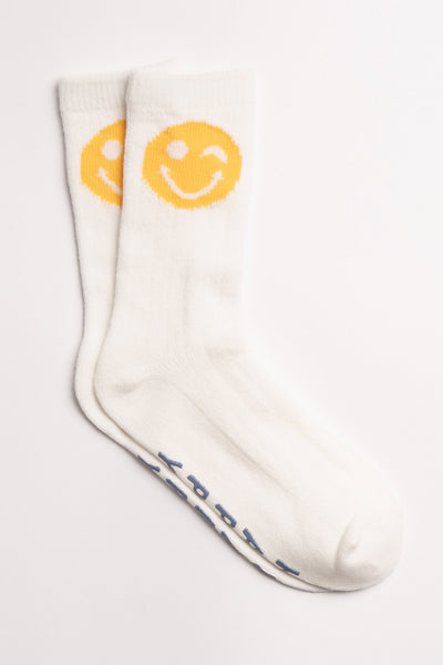 Ivory ribbed socks with happy faces on ankle & 'Happy" printed gripper graphic on soles. (7231871647844)