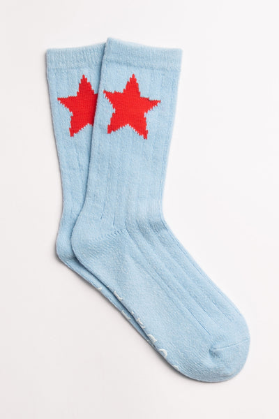 Soft blue ribbed socks with red stars on ankle & 'Country Girl' printed gripper graphic on soles. (7231871713380)