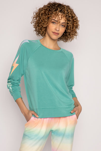 Green long sleeve top with multi-color lightning bolt print on sleeves. Modal-blend French terry. (7196189065316)