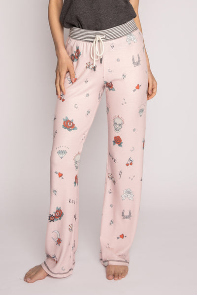 Pink straight pajama pant in printed mini waffle knit with a rock & roll theme pattern. Striped waist. (7196189884516)