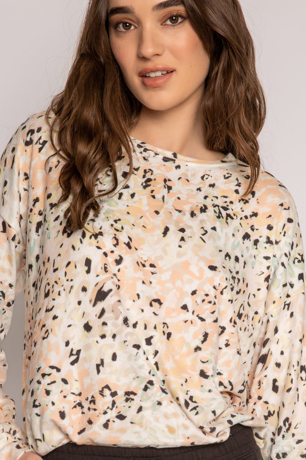 Long sleeve top in coral-ivory-black leopard print. Butter jersey knit pj top with banded hem. (7196190146660)