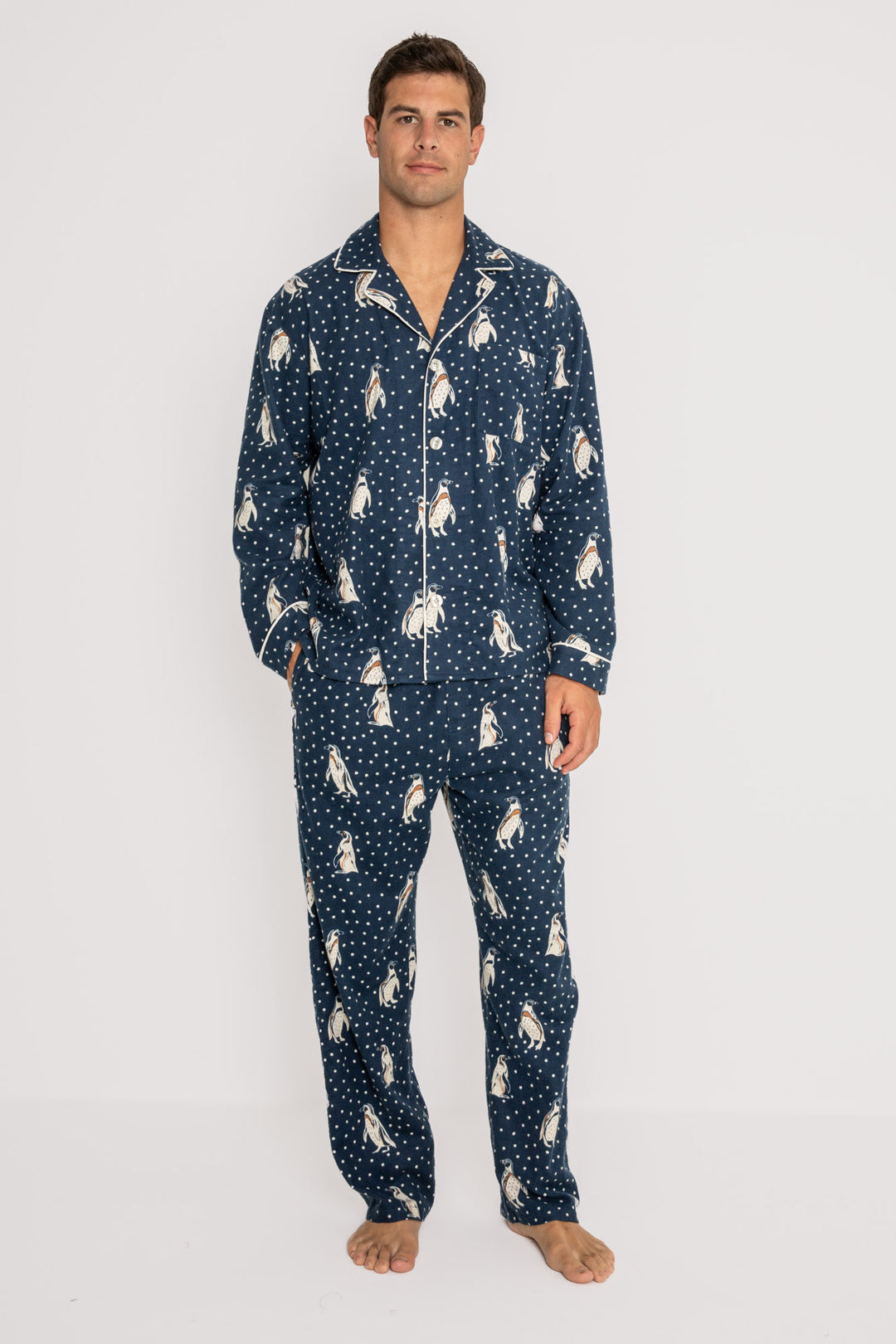 Men's navy cotton flannel pajama set button top & tie-pant with penguin print. (7231876923492)