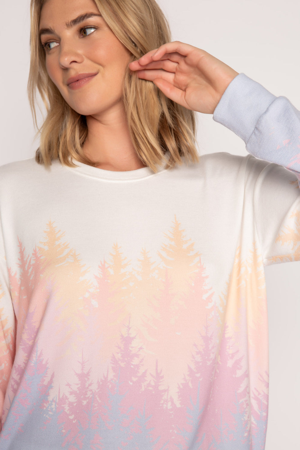 Ivory lounge top with pastel alpine tree-printed graphic on lower body. (7231877972068)