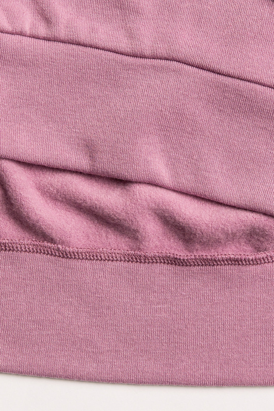 Fleece jogger in mauve with multi-color heart printed on sides. (7231878266980)
