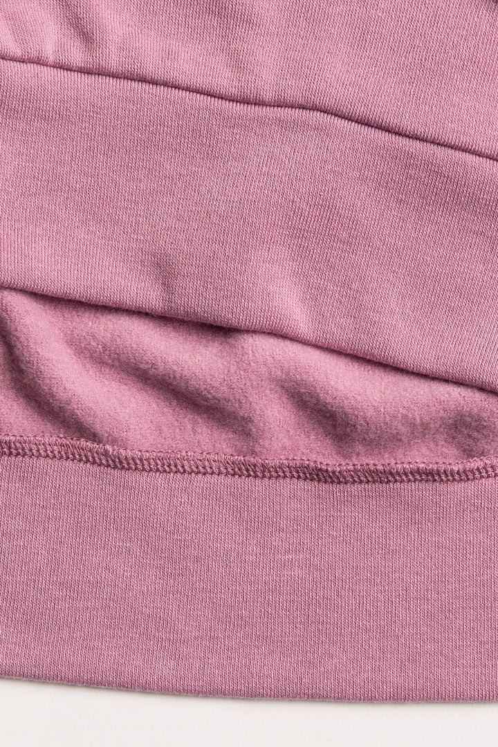 Fleece jogger in mauve with multi-color heart printed on sides. (7231878266980)