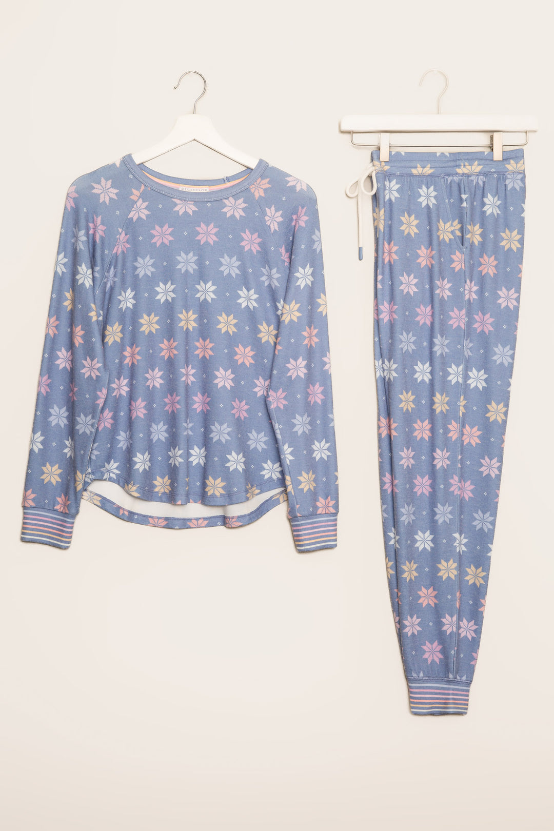 PJ jammie set in blue with pastel snowflake pattern. Top & pant with striped cuffs. (7231878824036)