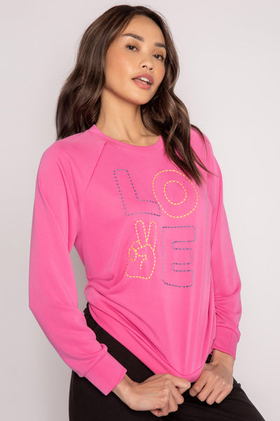 Hot pink pullover raglan top in modal French terry with colorful LOVE embroidery on front chest. (7231879676004)