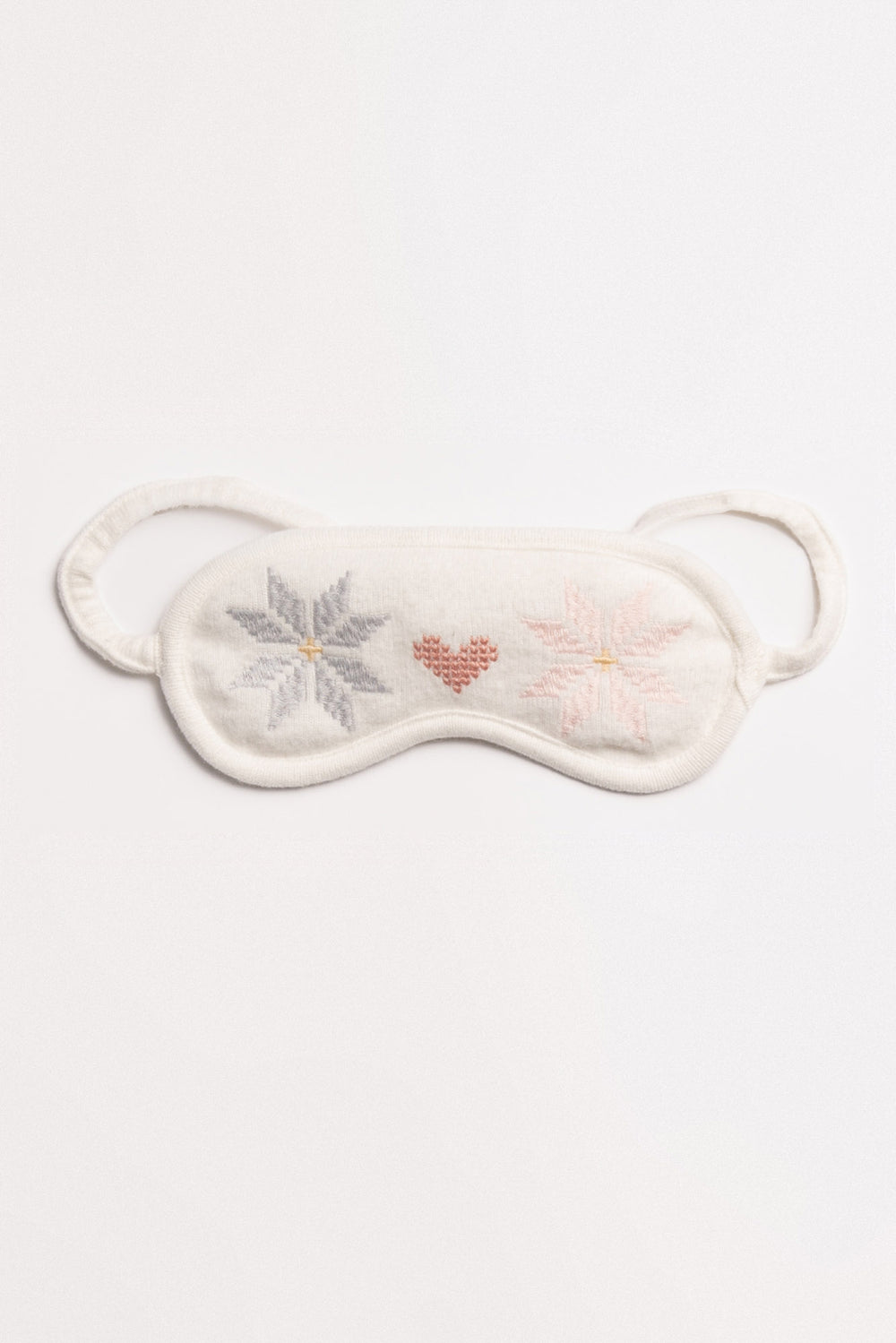 Sleep eye mask in ivory with embroidered snowflake & heart design. (7256838013028)