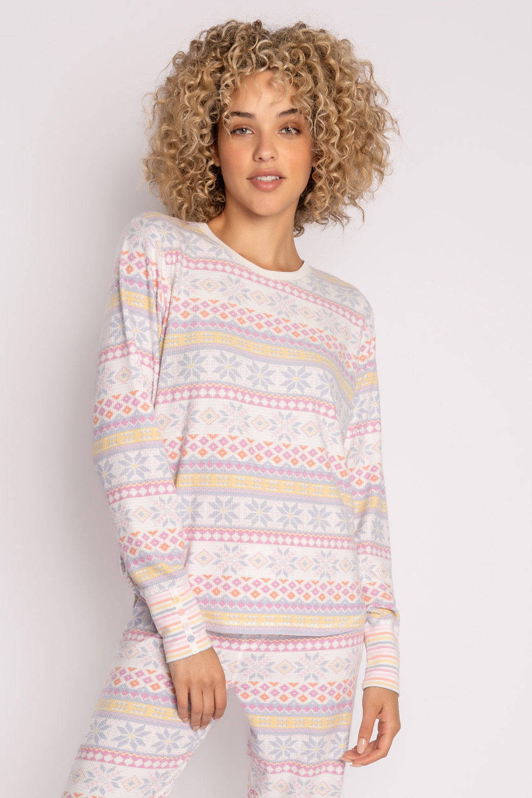 Velour pajama top in ivory with pastel fair isle winter pattern. Cuffs are striped & mini faux buttons. (7231880298596)