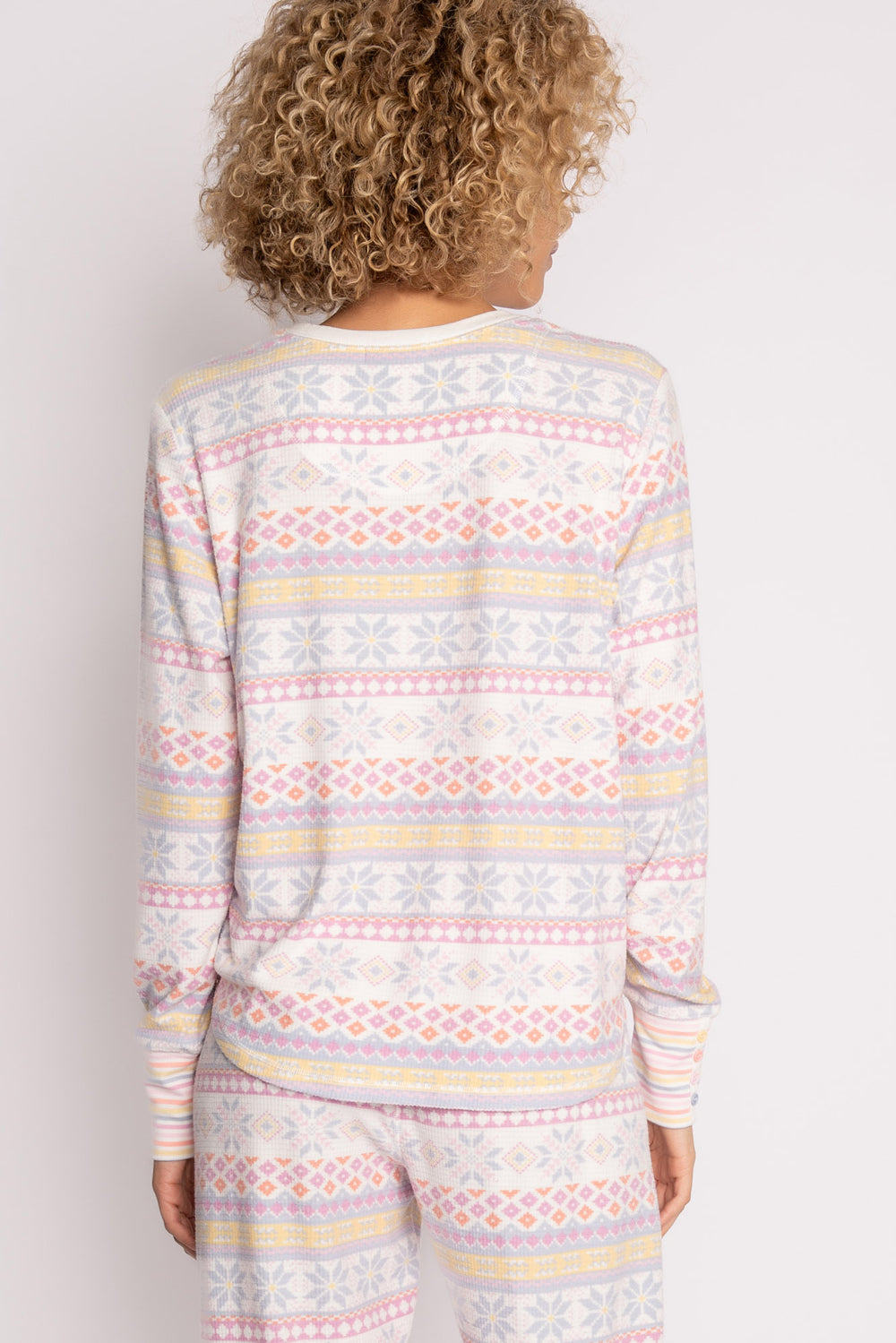 Velour pajama top in ivory with pastel fair isle winter pattern. Cuffs are striped & mini faux buttons. (7231880298596)