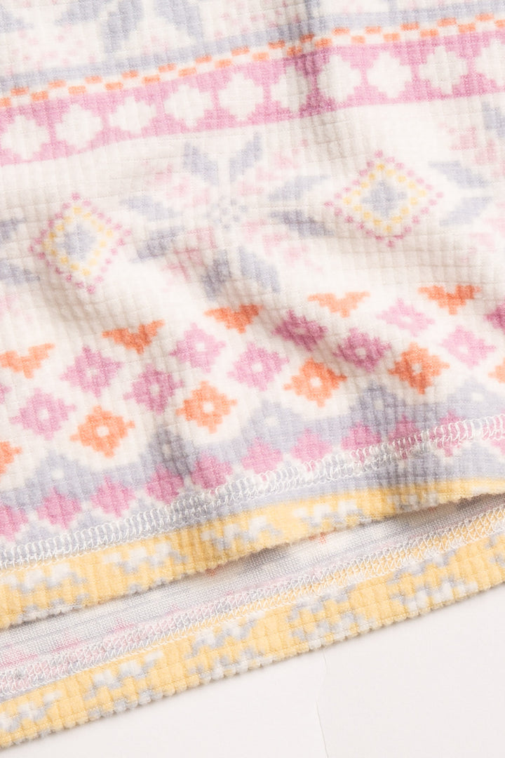 Velour pajama set in pastel fair isle winter pattern. Embroidered stitch neckline & colored buttons. (7231880822884)