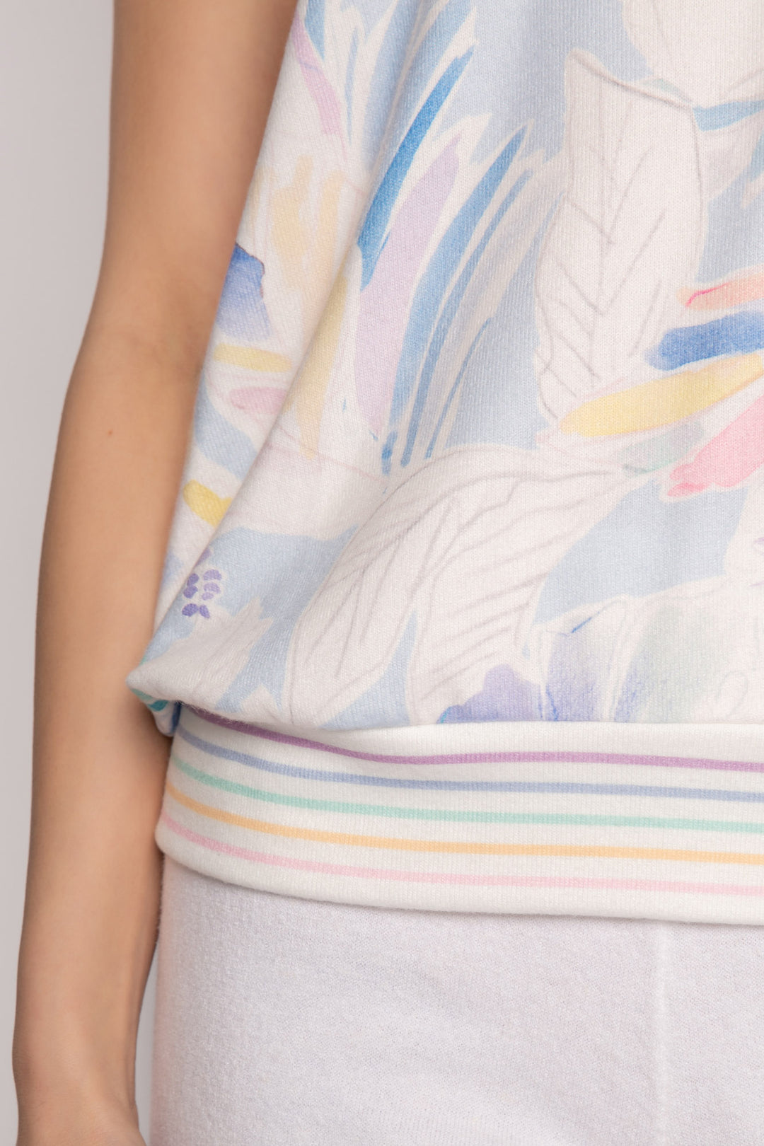 Racer tank top in watercolor painted floral. Pastel-striped rib banded hem. Relaxed fit. (7196188147812)