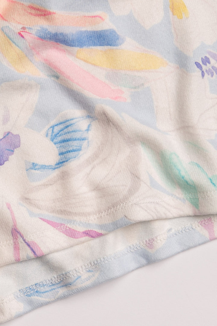 Racer tank top in watercolor painted floral. Pastel-striped rib banded hem. Relaxed fit. (7196188147812)