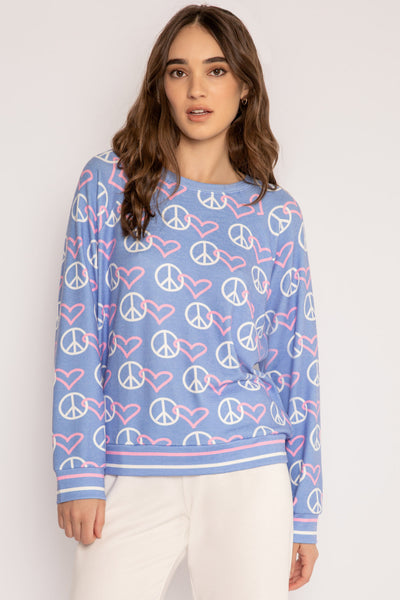 Printed long sleeve top in blue-white-pink peace pattern. Brushed peachy with striped cuffs & hem. (7196190736484)