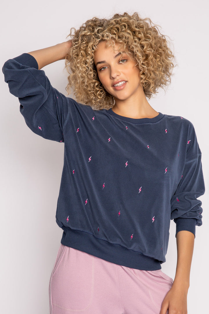 Dark blue pullover top with mini lightning bolt embroideries on exposed boucle' fleece knit. (7231883837540)
