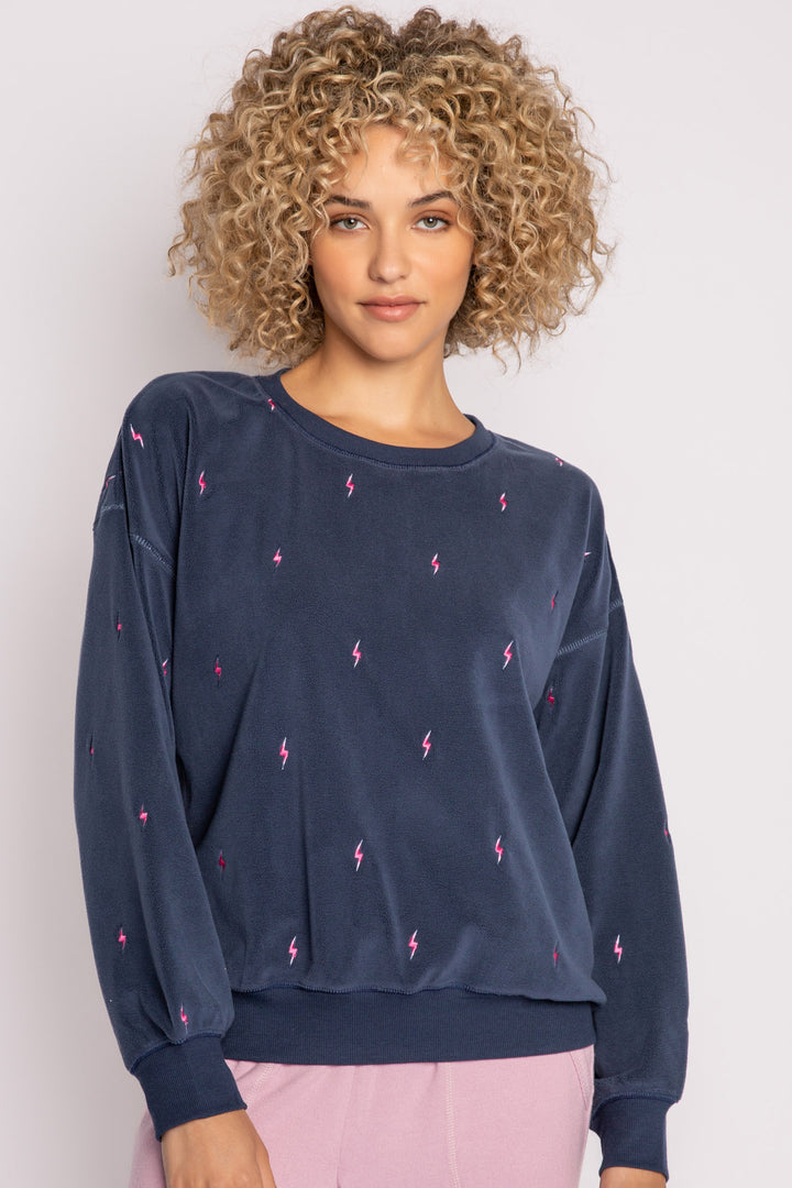 Dark blue pullover top with mini lightning bolt embroideries on exposed boucle' fleece knit. (7231883837540)